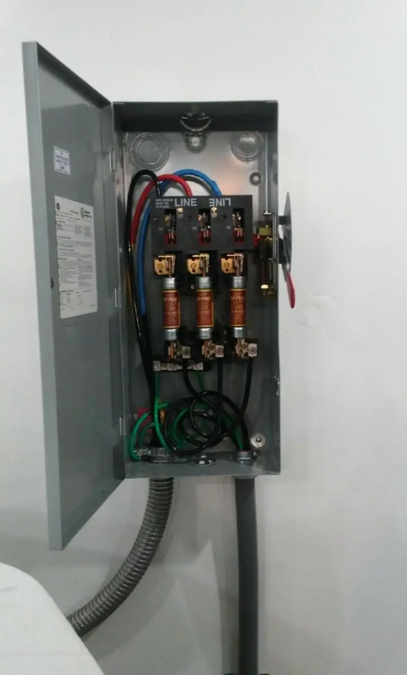 Three-phase disconnect switch installed for Smoke Detector Installation in Clever